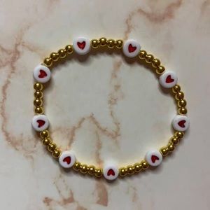 Golden Bracelet with Red hearts